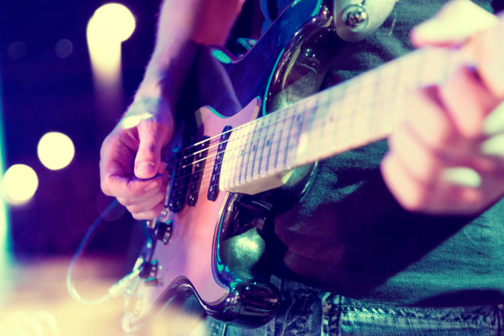 SH chitarra musicista mani