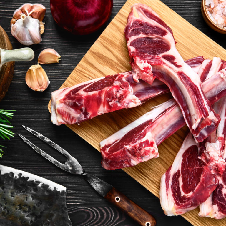 top view of raw lamb rib chops on cutting board 2022 03 29 07 27 00 utc