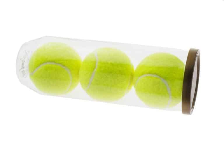 transparent tube of 3 tennis balls on a white background m.jpg
