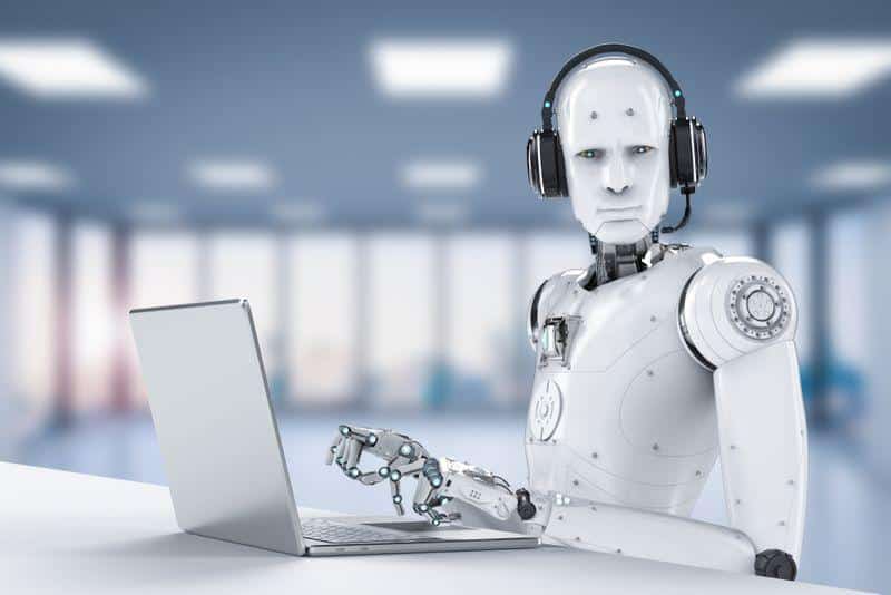 3d rendering of a white humanoid android typing on a laptop and wearing a headset staring at the camera m.jpg