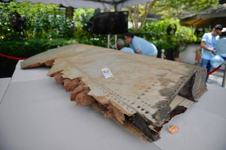 a piece of debris belong to flight mh370 is displayed during the remembrance ceremony m.jpg