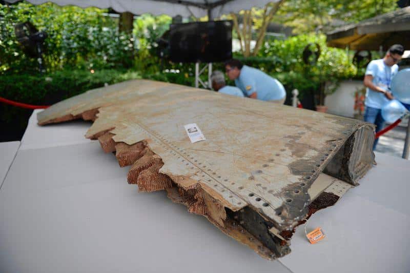 a piece of debris belong to flight mh370 is displayed during the remembrance ceremony m.jpg