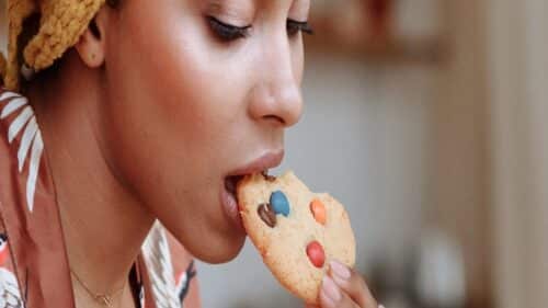 PersonEatingMMCookie 1 500x281.jpg