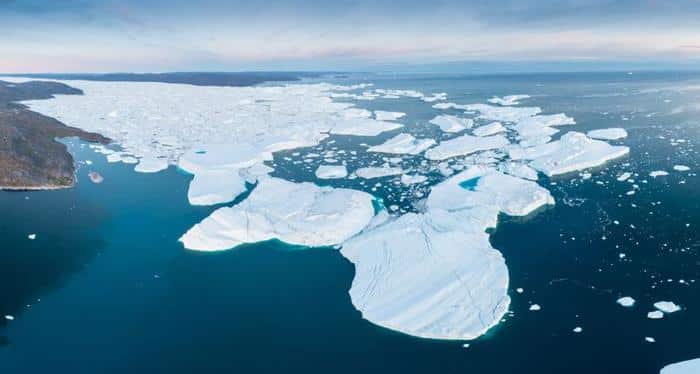 aerial photograph of a melting iceberg in ilulissat greenland m.jpg