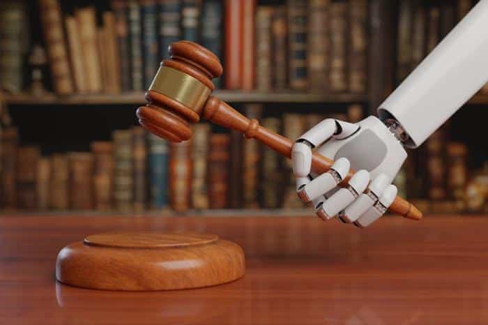 robot hand holding gavel m 1.jpg
