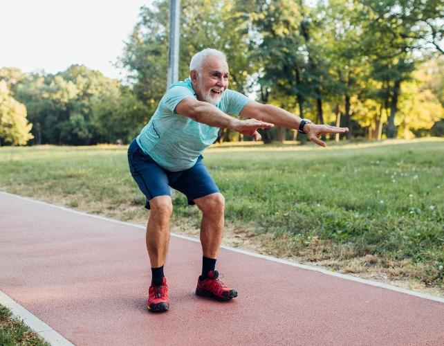 OlderPersonSquattingOutdoors.jpg