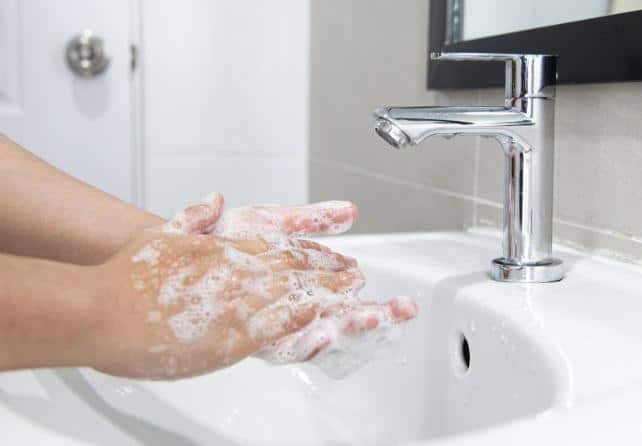 WashingHandsNextToTap642.jpg