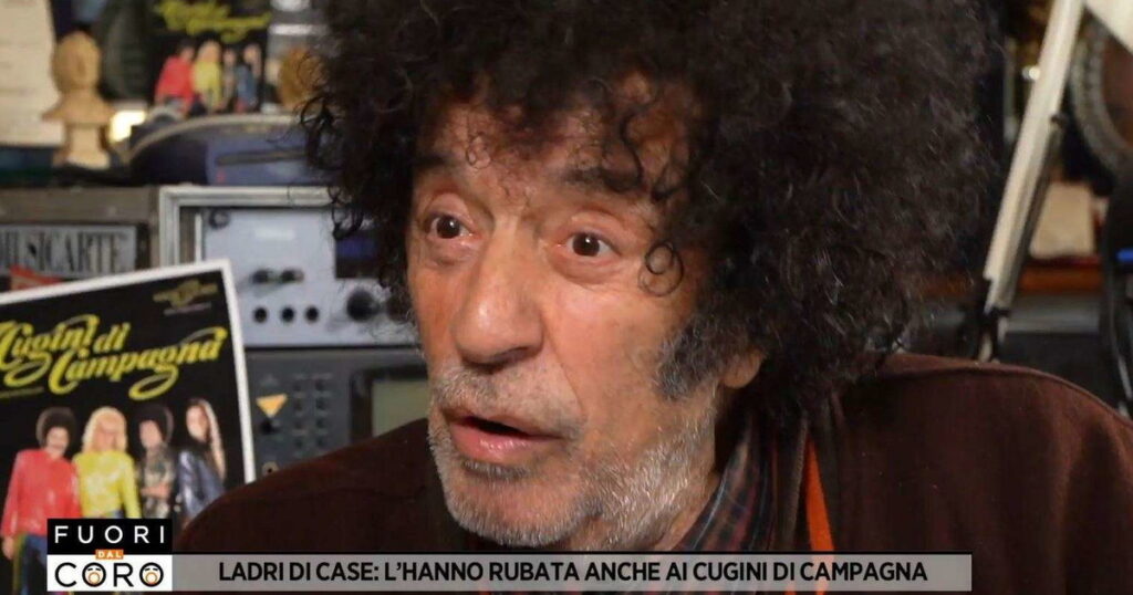 Uomo con capelli ricci e barba